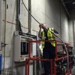 Engineer working on electrical wiring